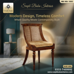 Classic wooden arm chair with rattan cane backrest and cushioned seat for interior décor