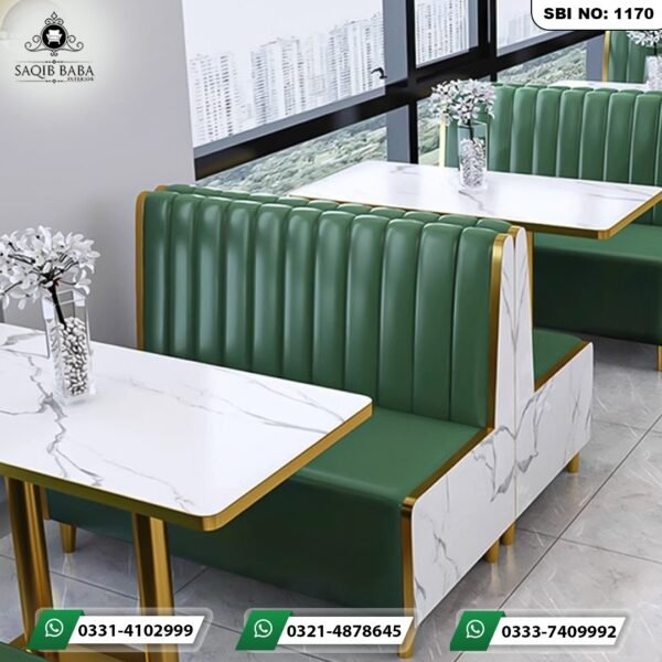 Luxury commercial cafe furniture set featuring green tufted booth seating and marble top tables by Saqib Baba Interior