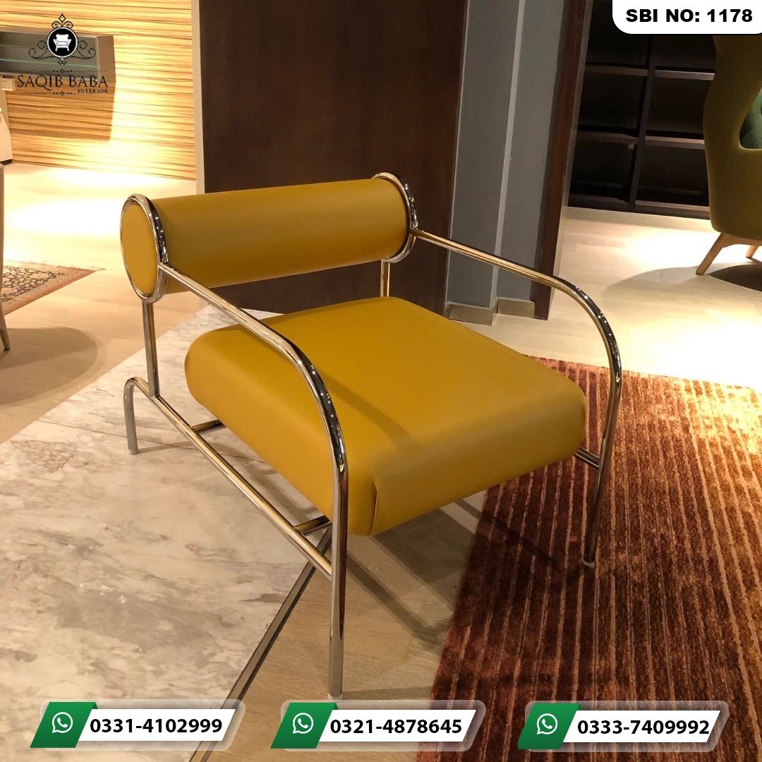 Executive Office Chairs Pakistan | Saqib Baba Interiors Modern executive office chairs Pakistan featuring a mustard yellow leather armchair with chrome steel frame by Saqib Baba Interiors.