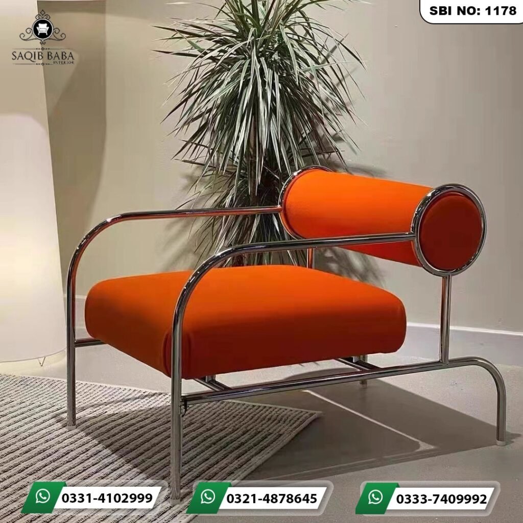 Modern orange minimalist lounge armchair with a glossy chrome tubular metal frame and cylindrical bolster backrest by Saqib Baba Interior