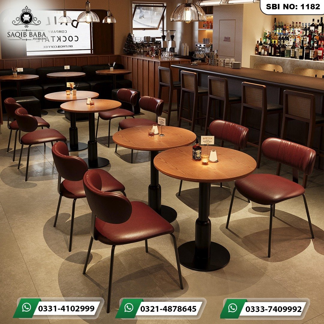 Luxury Cafe Table Pakistan | Saqib Baba Interiors Premium cafe table Pakistan with dark solid wood top and green chairs by Saqib Baba Interiors.