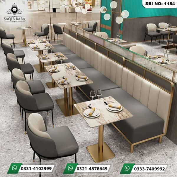 Luxury cream and grey banquette booth seating set with vertical tufted benches matching dual tone chairs and marble top tables by Saqib Baba Interior