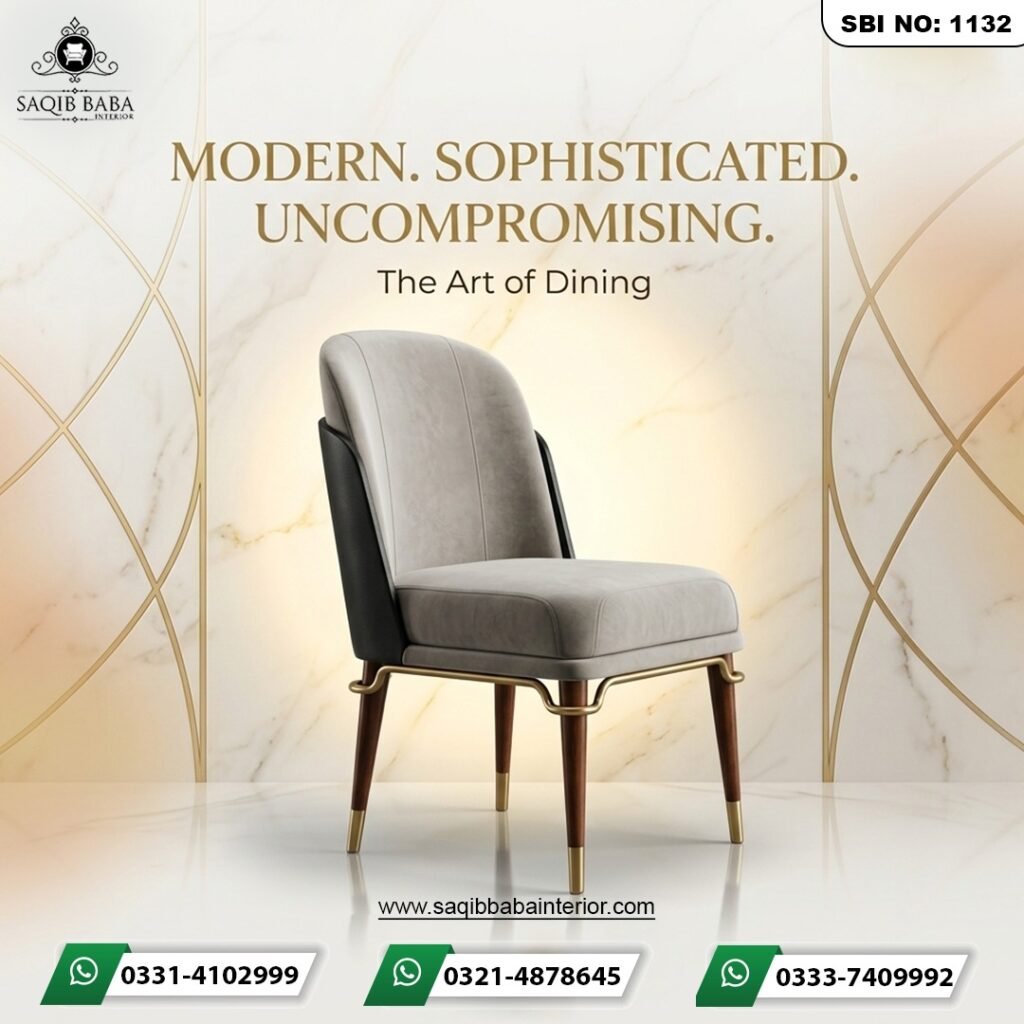 A luxury dining chair featuring a light grey velvet front, black leather back, and wooden legs with gold metal accents.