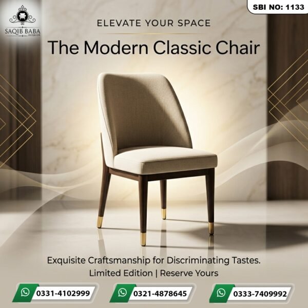A sophisticated cream-colored fabric dining chair with a dark walnut wood frame and gold-tipped legs, set against a luxury marble background.