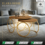 A pair of circular nesting coffee tables with warm oak-finish wooden tops and unique interlocking gold ring metal bases.