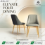 Pair of modern dining chairs in charcoal grey and soft stone grey with elegant gold-finished tapered legs.