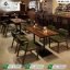 Restaurant furniture Pakistan wooden tables and green leather chairs by Saqib Baba Interiors.
